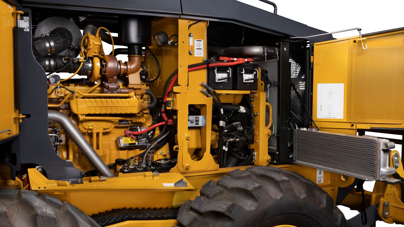 Open engine compartment of a John Deere motor grader showing service access to key components