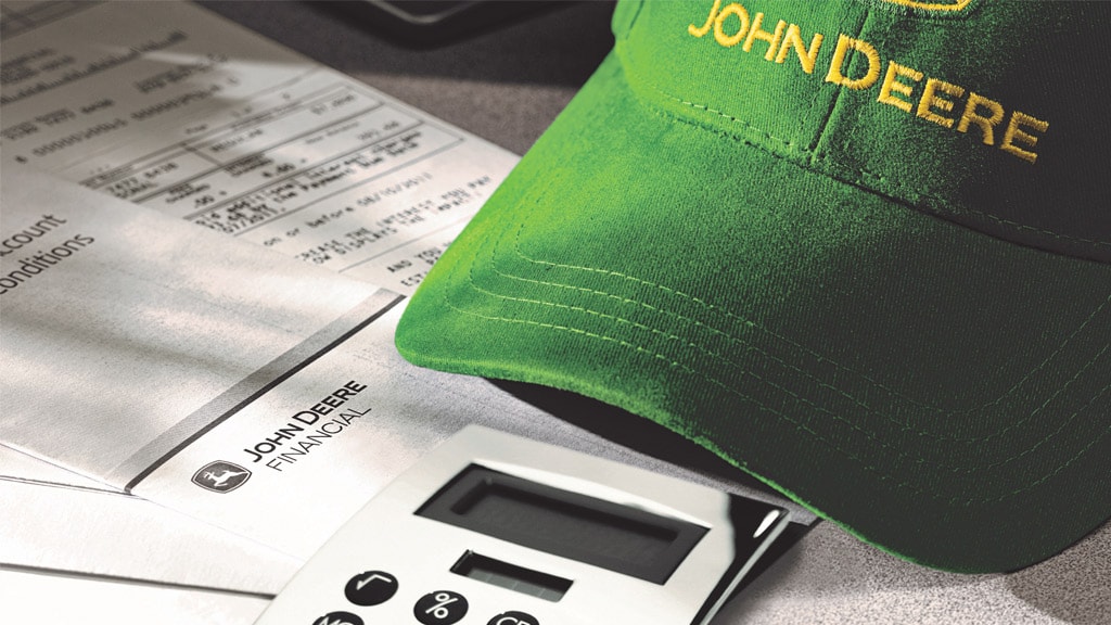 Picture of a John Deere cap integrated with John Deere Financial - Digital solutions for agribusiness