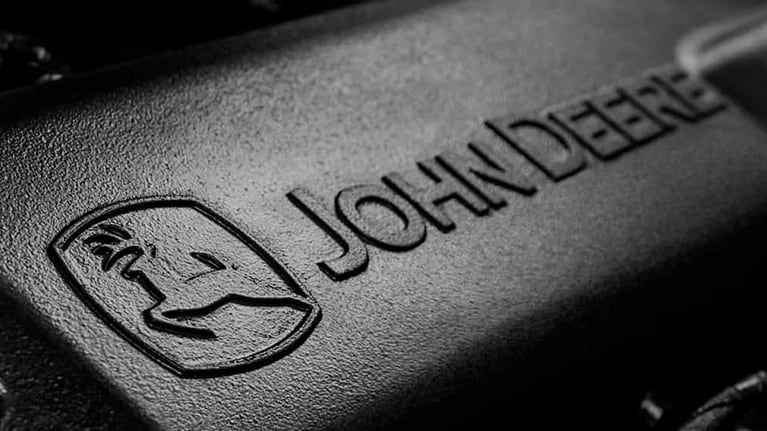 Close up of the John Deere logo on an engine block