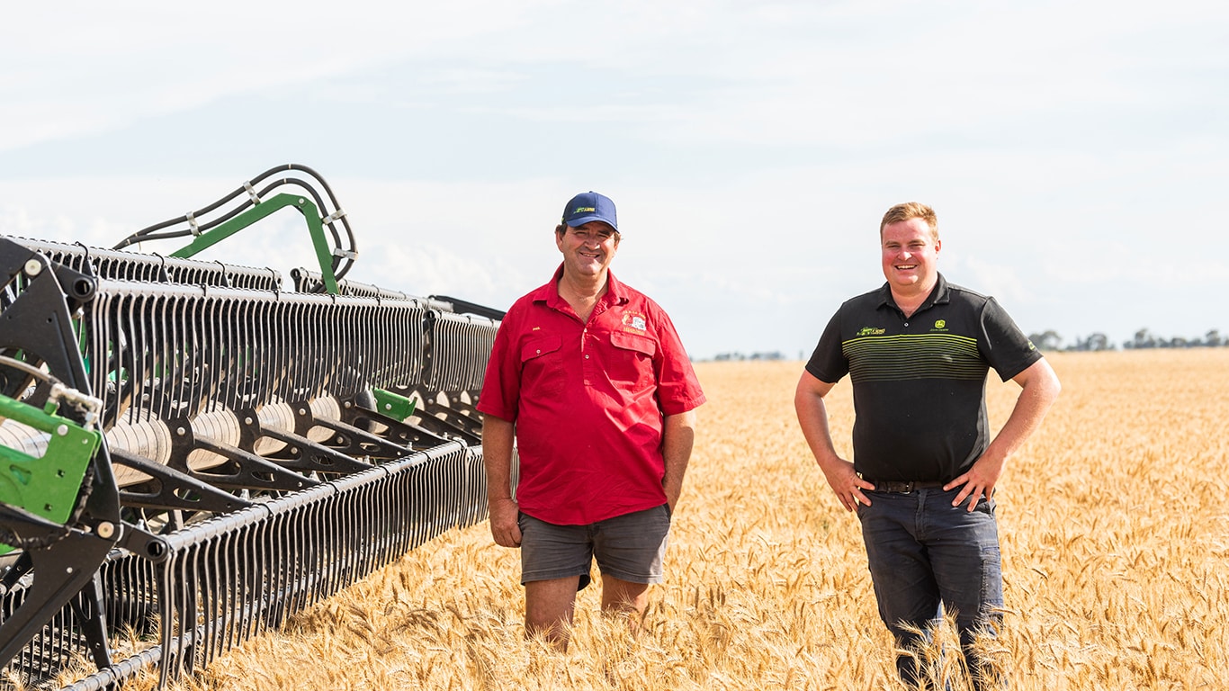 John Deere's Max Cusack and grain grower Paul Park at X Series Demonstration Day