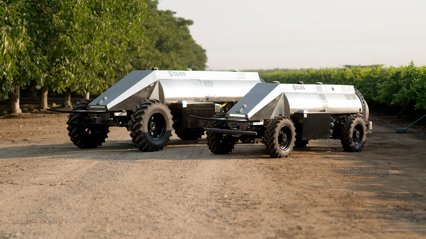 silver tanks with the GUSS logo on them