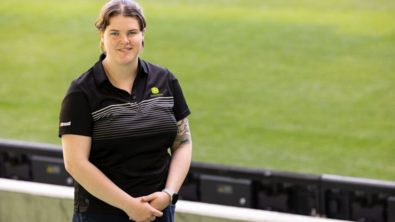 Codi Long, fourth-year apprentice, City of Greater Bendigo, standing in stadium.