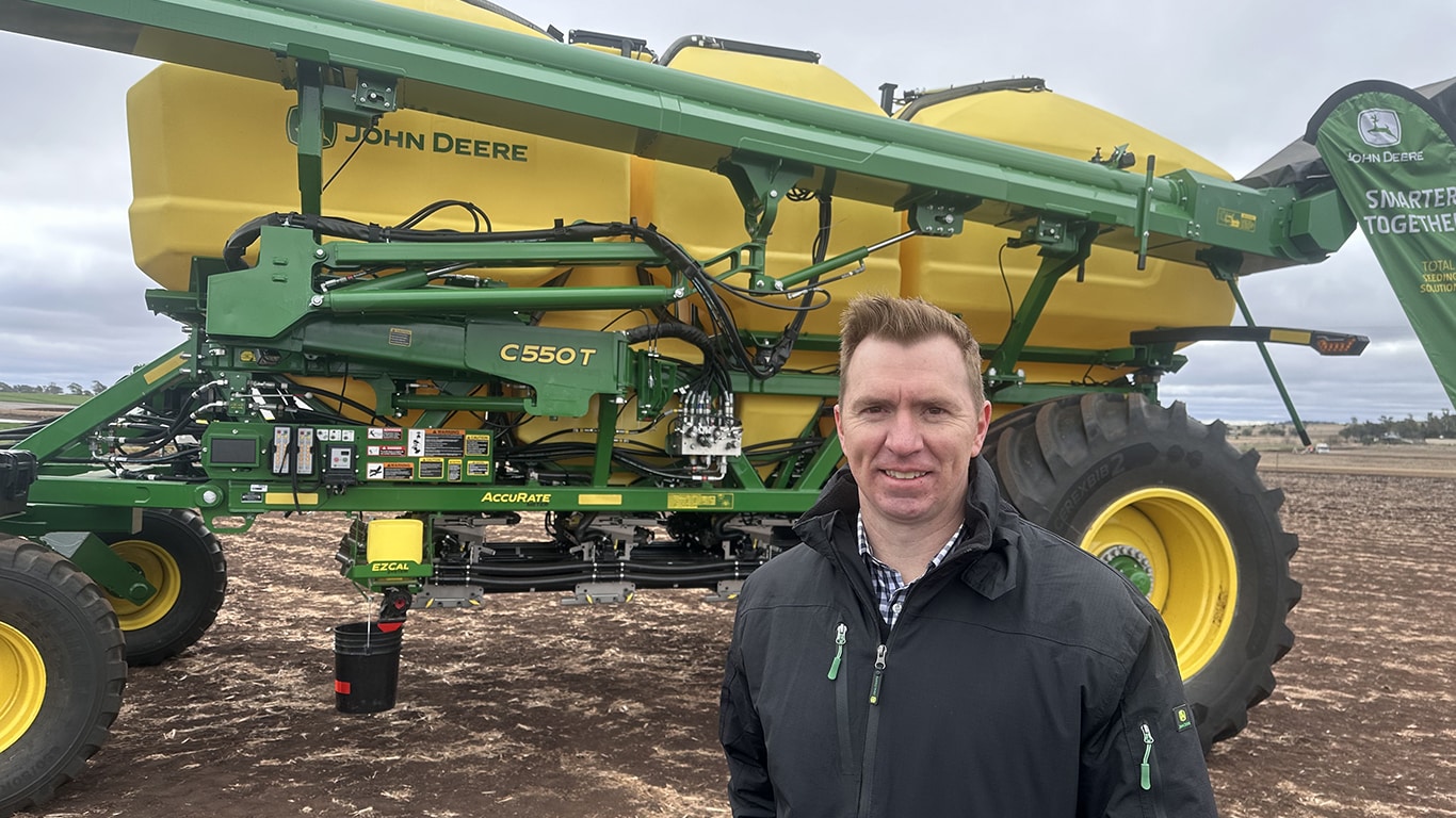 Man with John&nbsp;Deere Seeding Air Cart