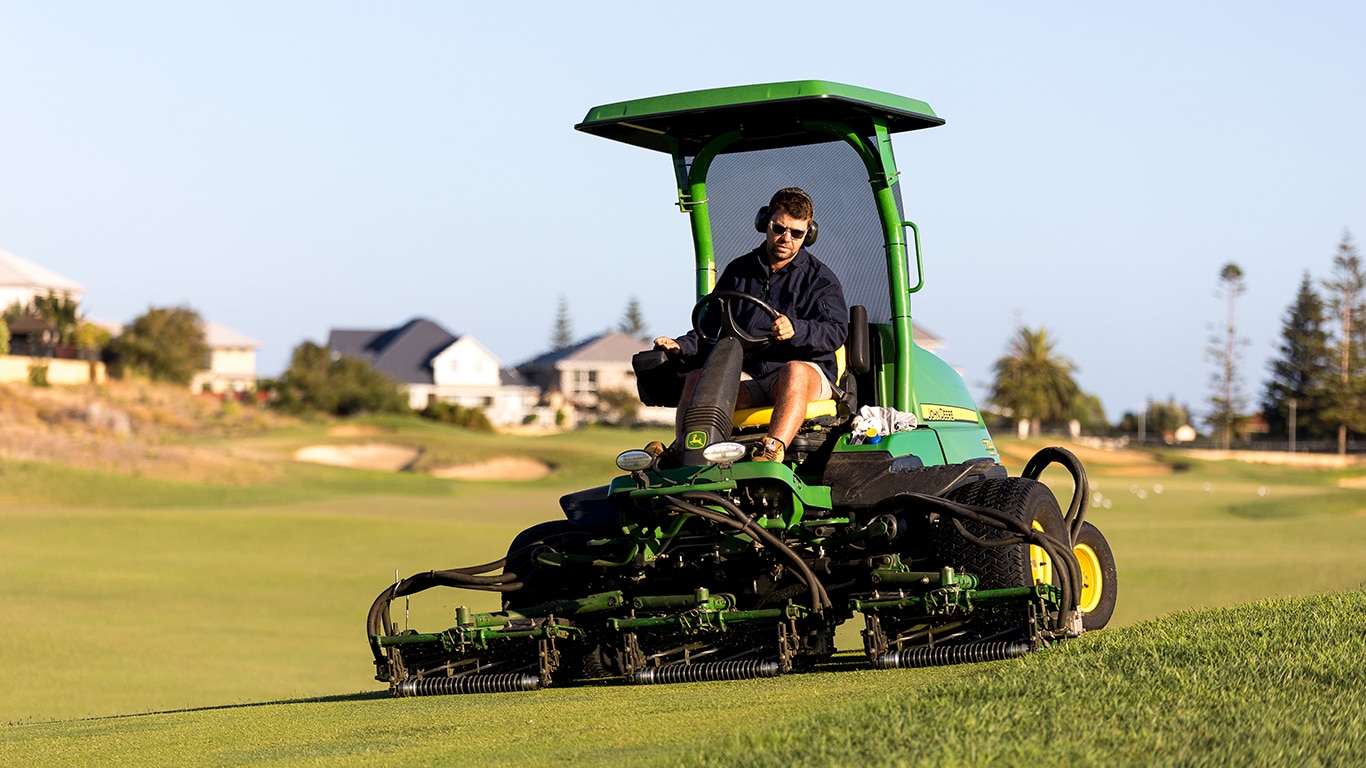 Tom Tristram mowing the fairways at Secret Harbour