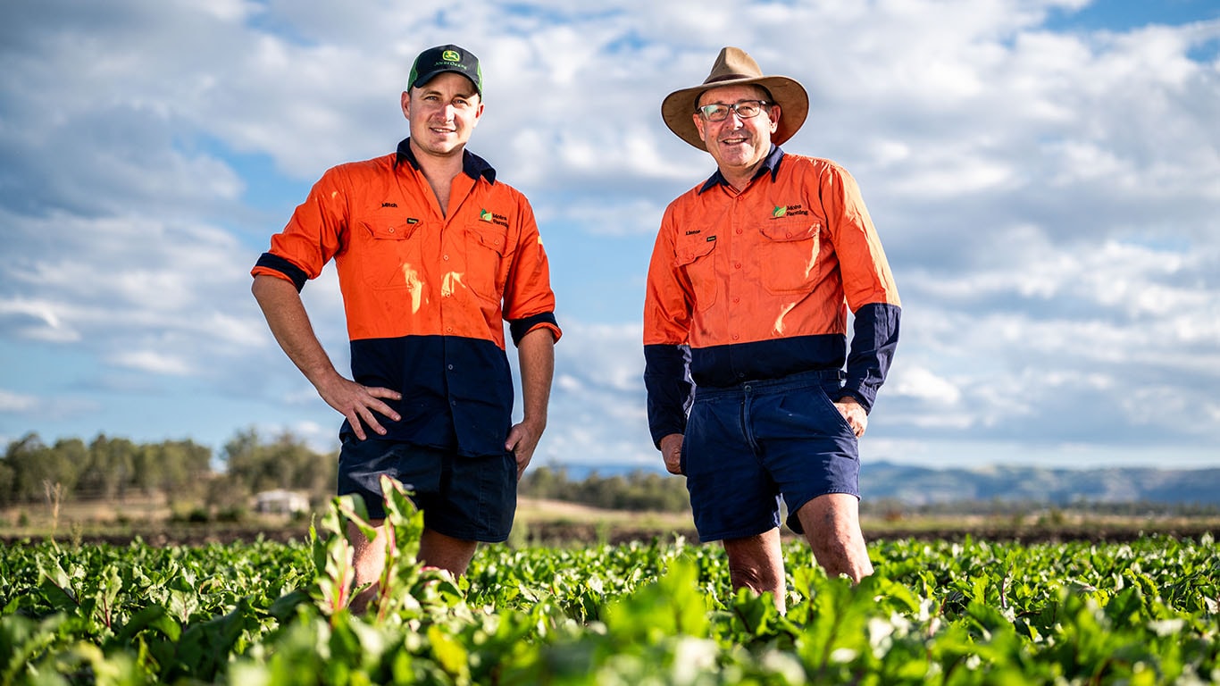 Linton Brimblecombe and son Mitch standing in field