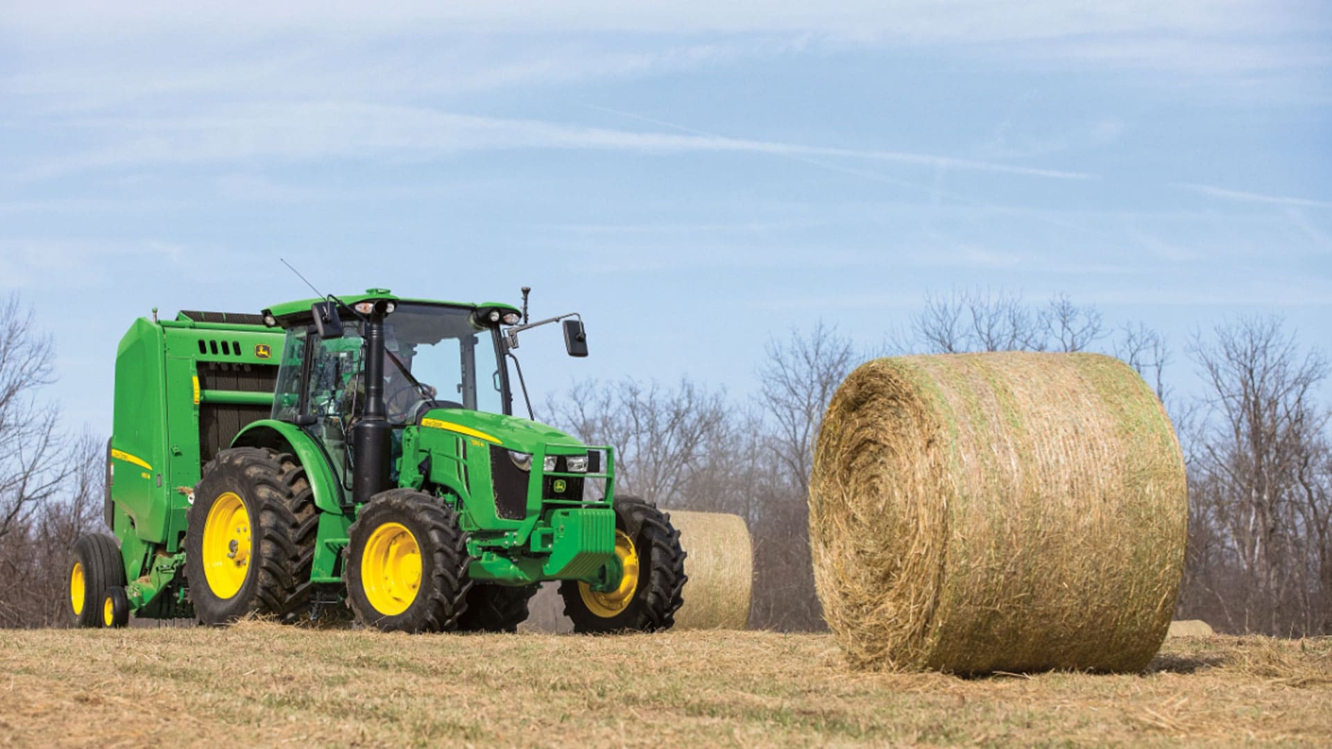 image of 540M tractor and baler