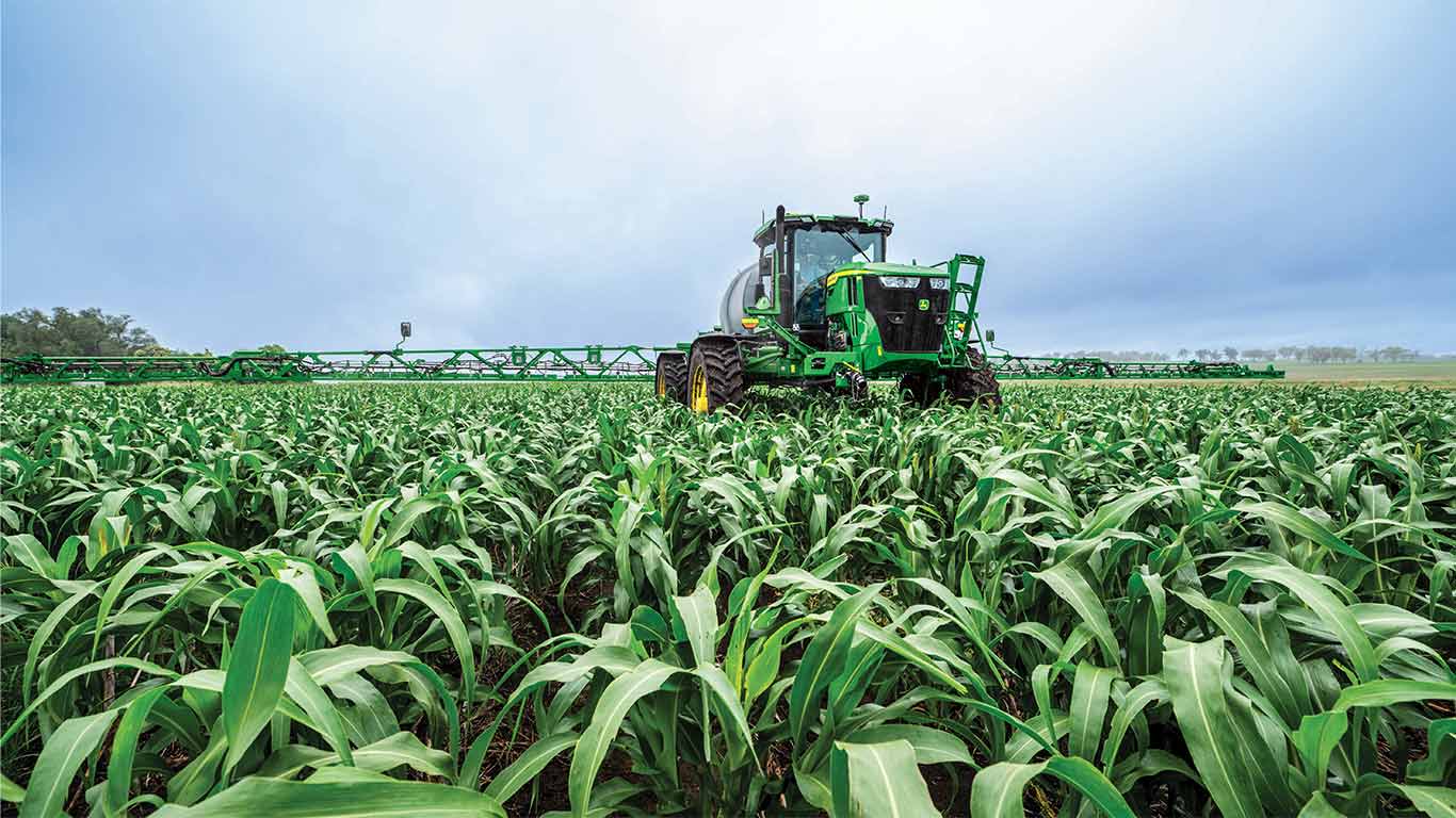 John Deere sprayer in paddock.