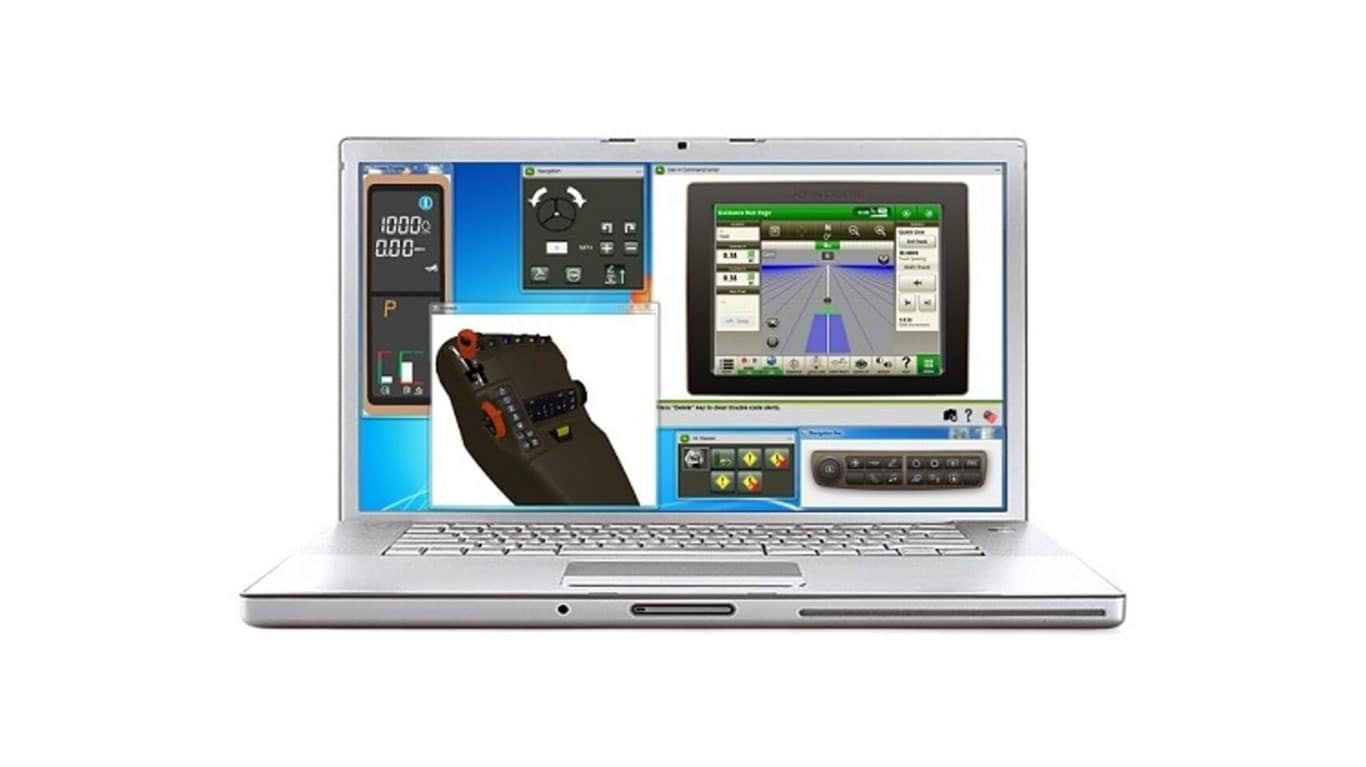 Laptop computer showing agriculture equipment simulator software
