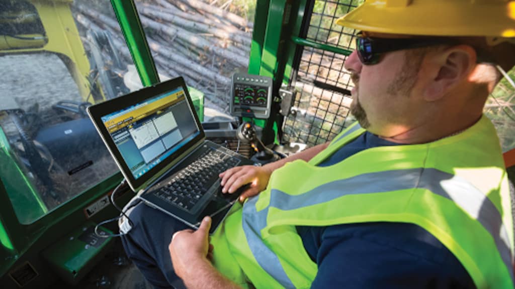 Aerial view of forestry equipment surrounded by a computer-generated overlay of a sensor circle