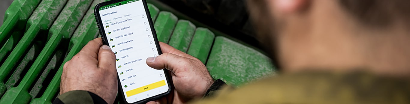 Man checks a mobile phone