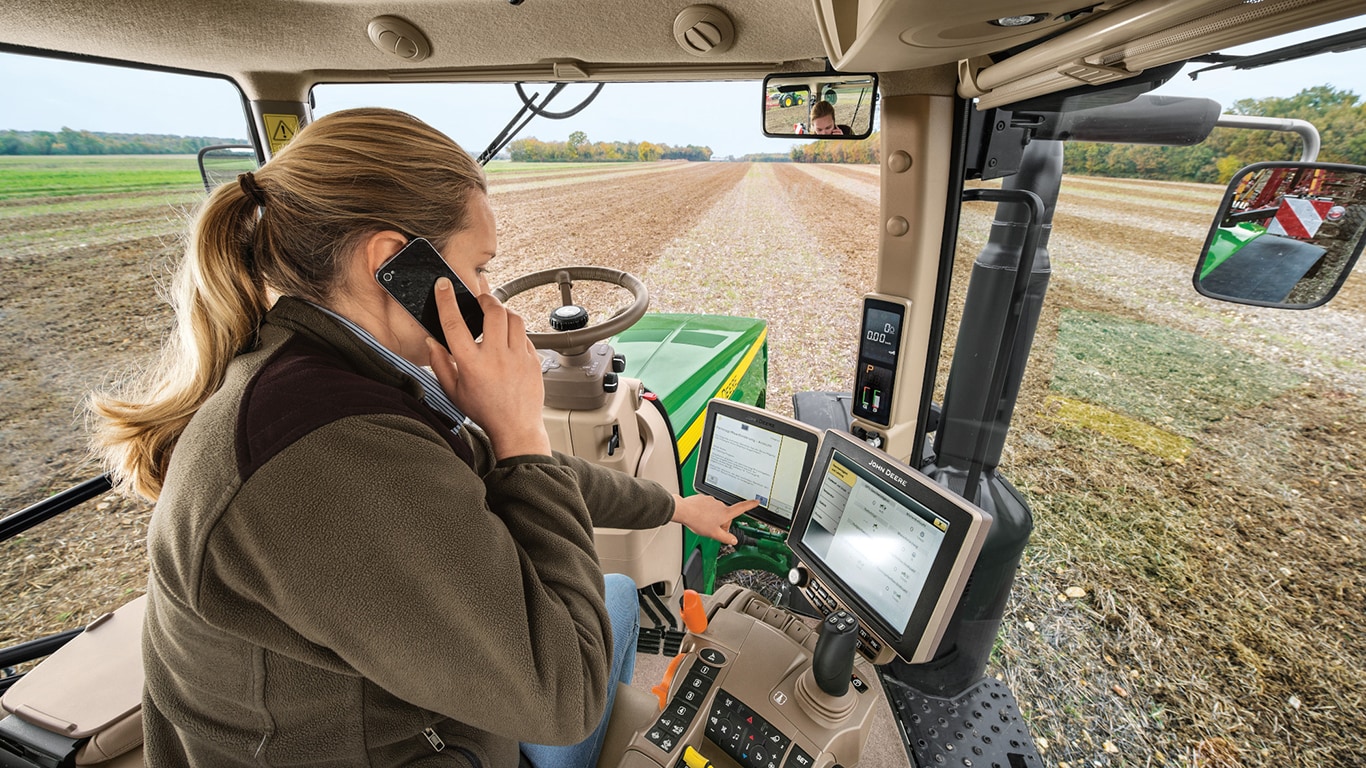 Inside Tractor showing Operation Center on monitors.