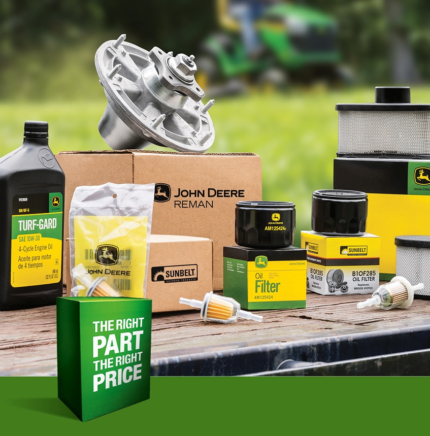 a variety of John&nbsp;Deere parts on a countertop