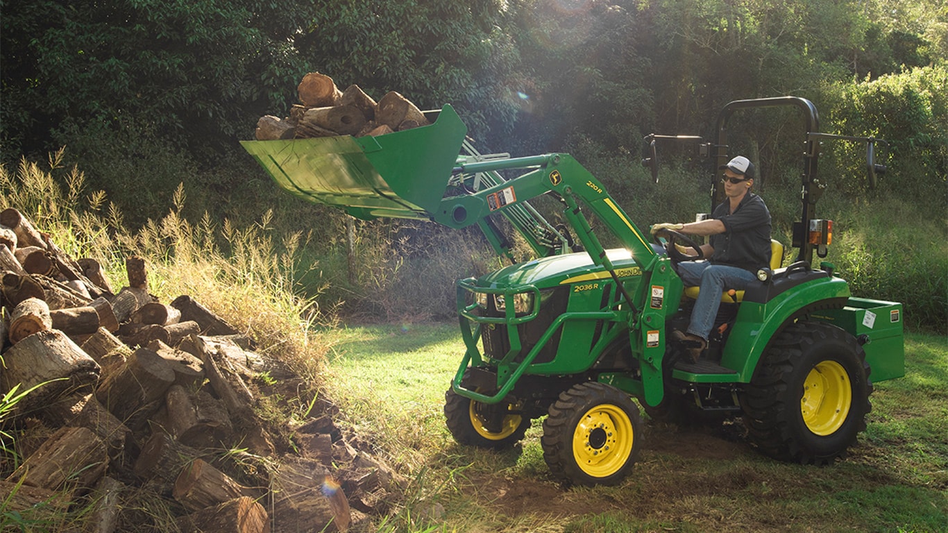 Add More, Do More - Compact Utility Tractor loading wood