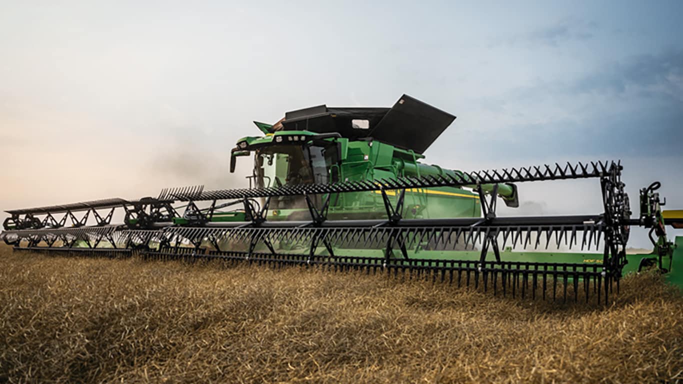 Combine harvesting in wheat field