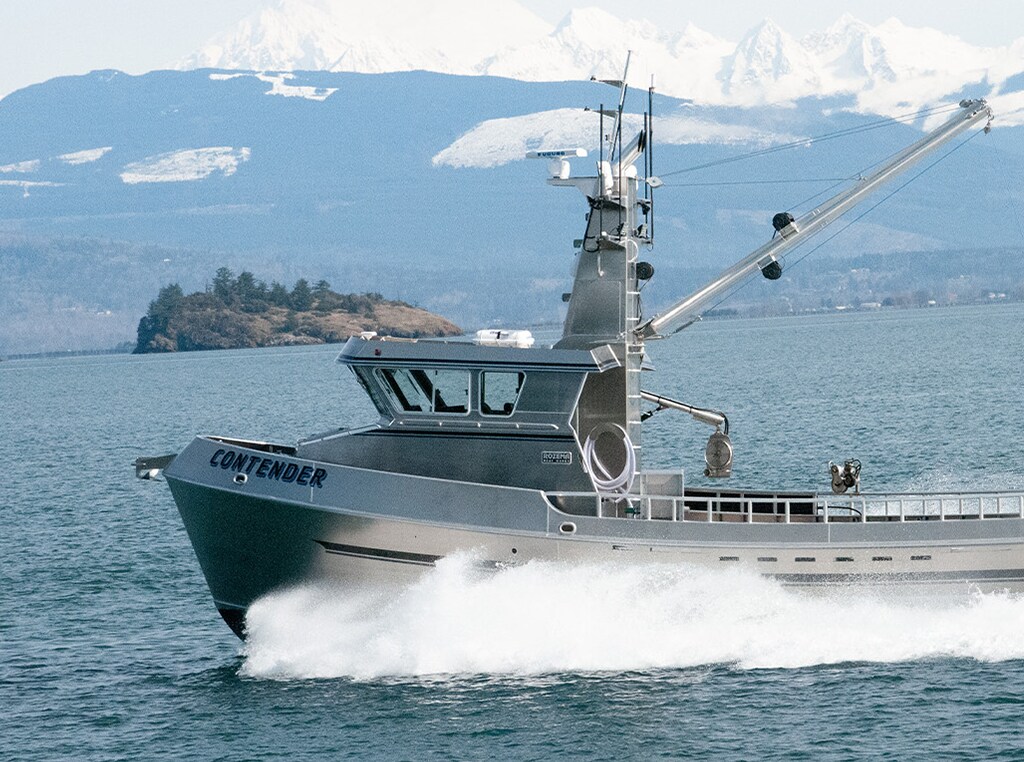 The Contender fishing boat cruising out on the waters of the Pacific Northwest powered by a John Deere marine engine.