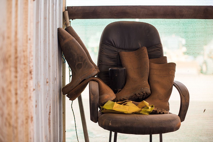 Brown boots on the brown chair