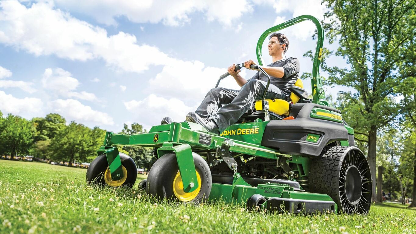 A person operating a ZTrak Zero-Turn Mower