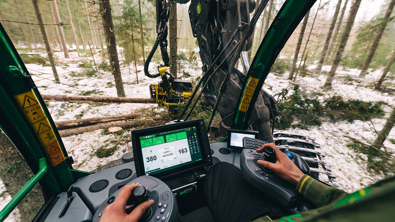 Harvester operator at work