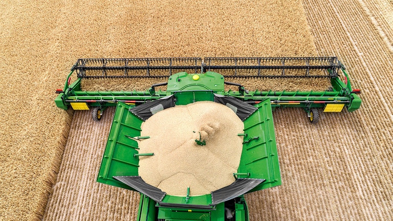 aerial image of hd series combine in a field