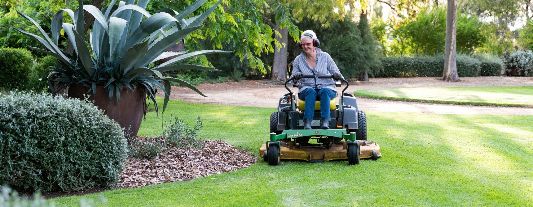 using a walk behind spreader