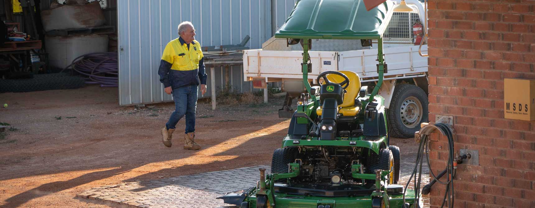 using a walk behind spreader