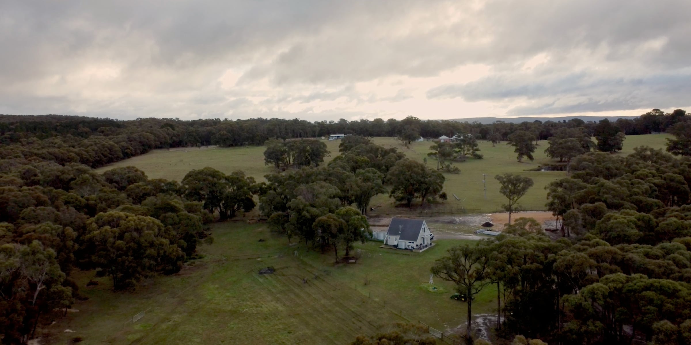 Landscape view of a regional property on a cloudy day