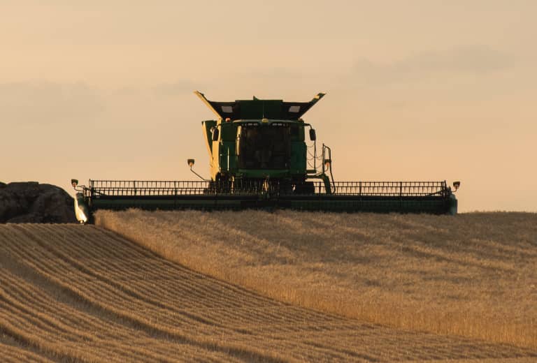 Harvester in field