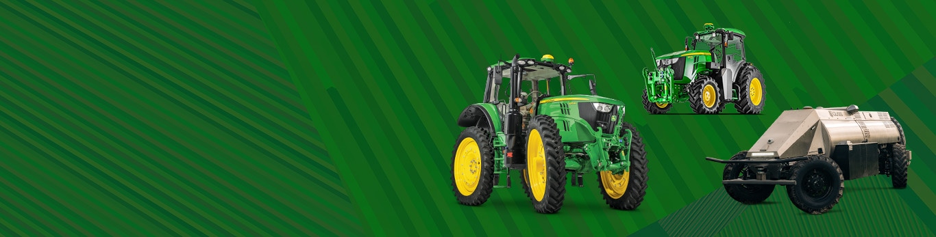 3 tractors of various size and distance in front of green lined banner.