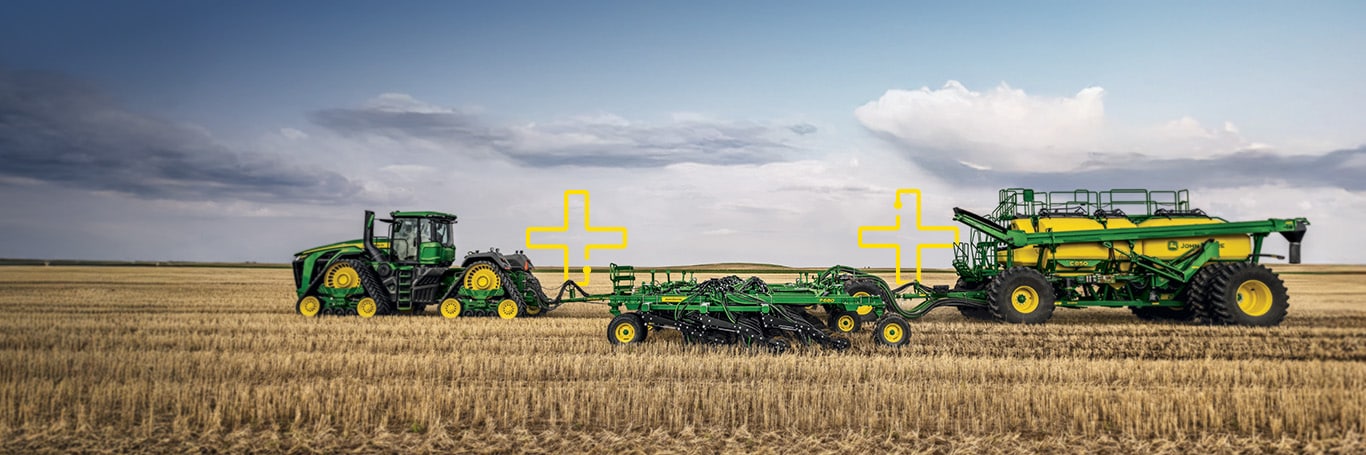 Tractor and sprayer out in the field