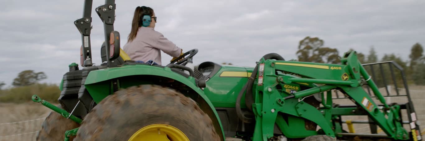 using a walk behind spreader