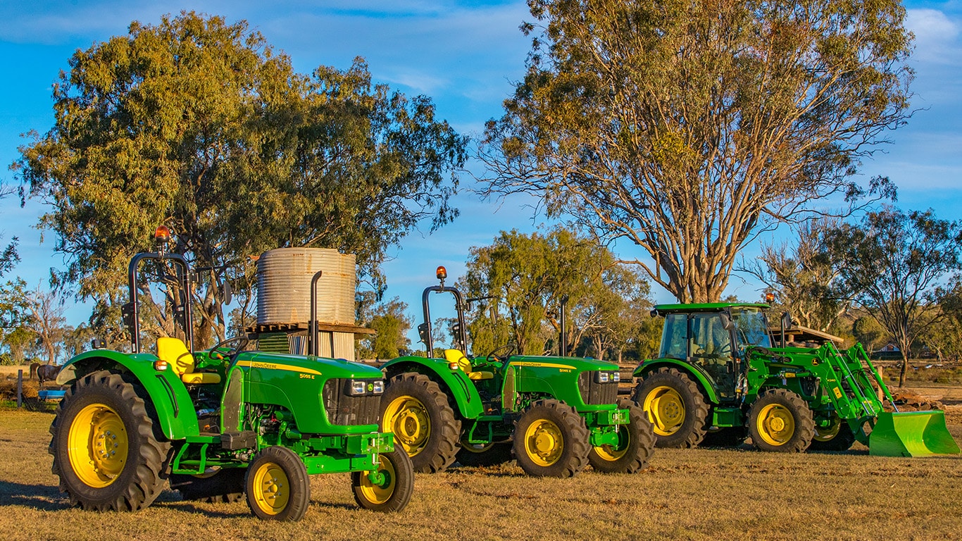 5 series John Deere tractors showing different features and attachments.