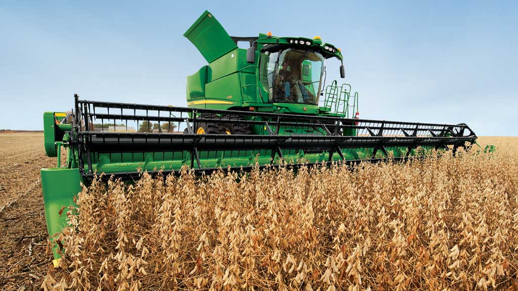 Auger platform on combine in a wheat field