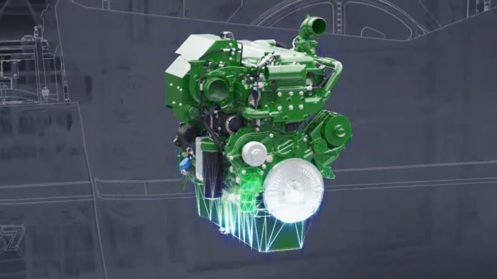Photo of an uninstalled John Deere PowerTech™ 13.6L engine against a blueprint-like background