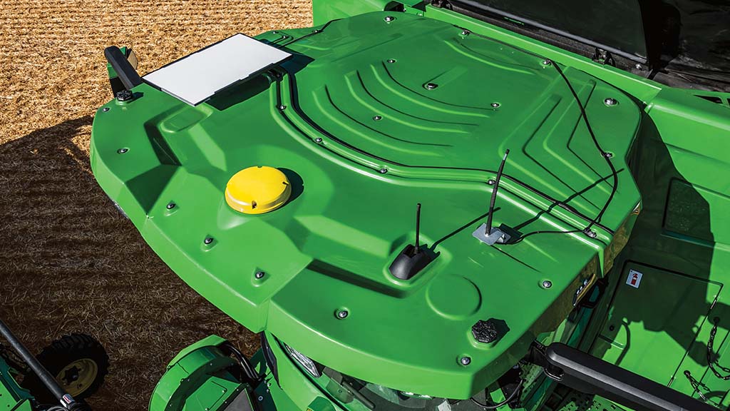 Aerial view of tractor cab roof with JDLink Boost installed.