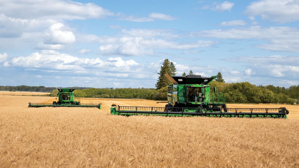 X-Series Combine Harvester moving through crops