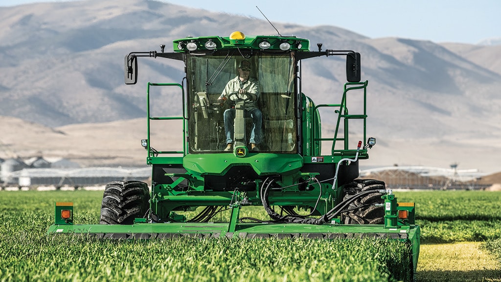 Image of windrower in field