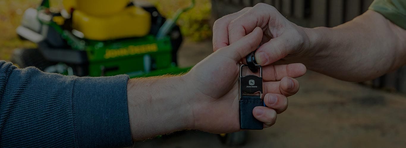 close-up of hand exchanging keys