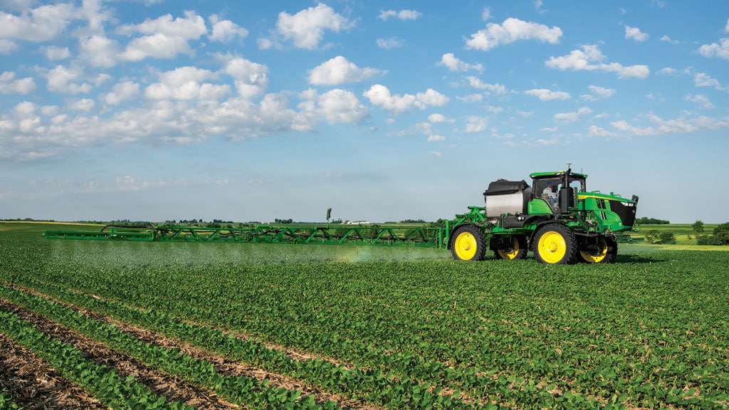 Sprayer using G5 Plus CommandCenter Display to control sections of a field.