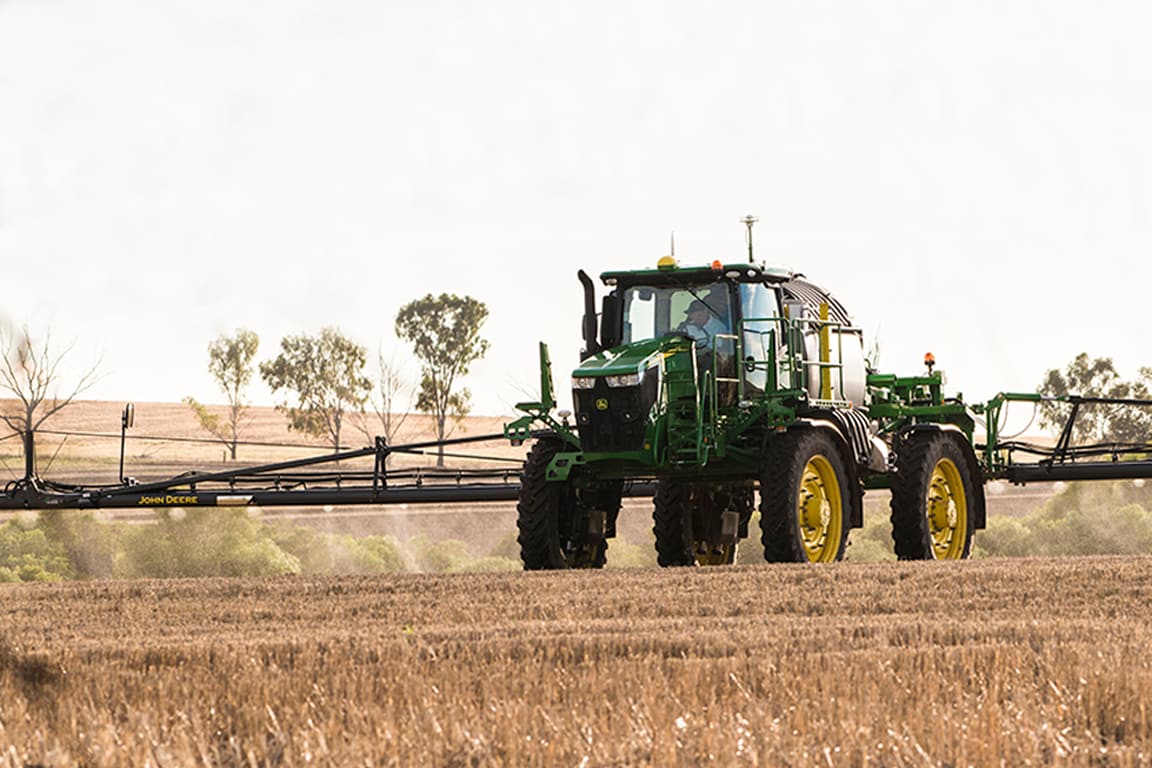 John Deere sprayer in a field