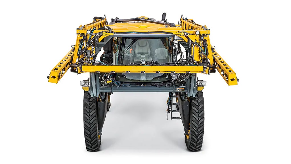 Front studio shot of a Hagie STS Self-Propelled Sprayer with booms folded.