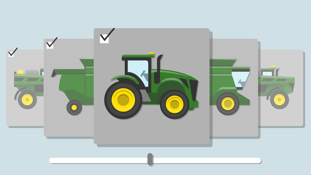 A green tractor with yellow wheels