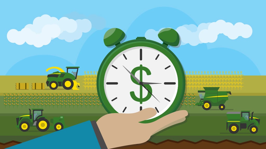 A hand holding a clock