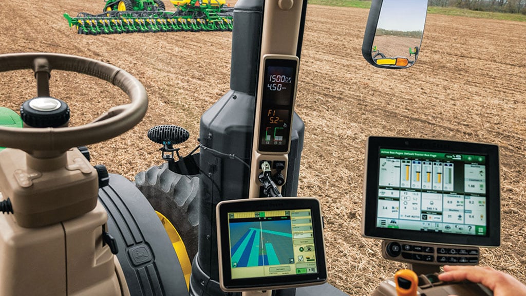 Image of inside a tractor cab with two displays