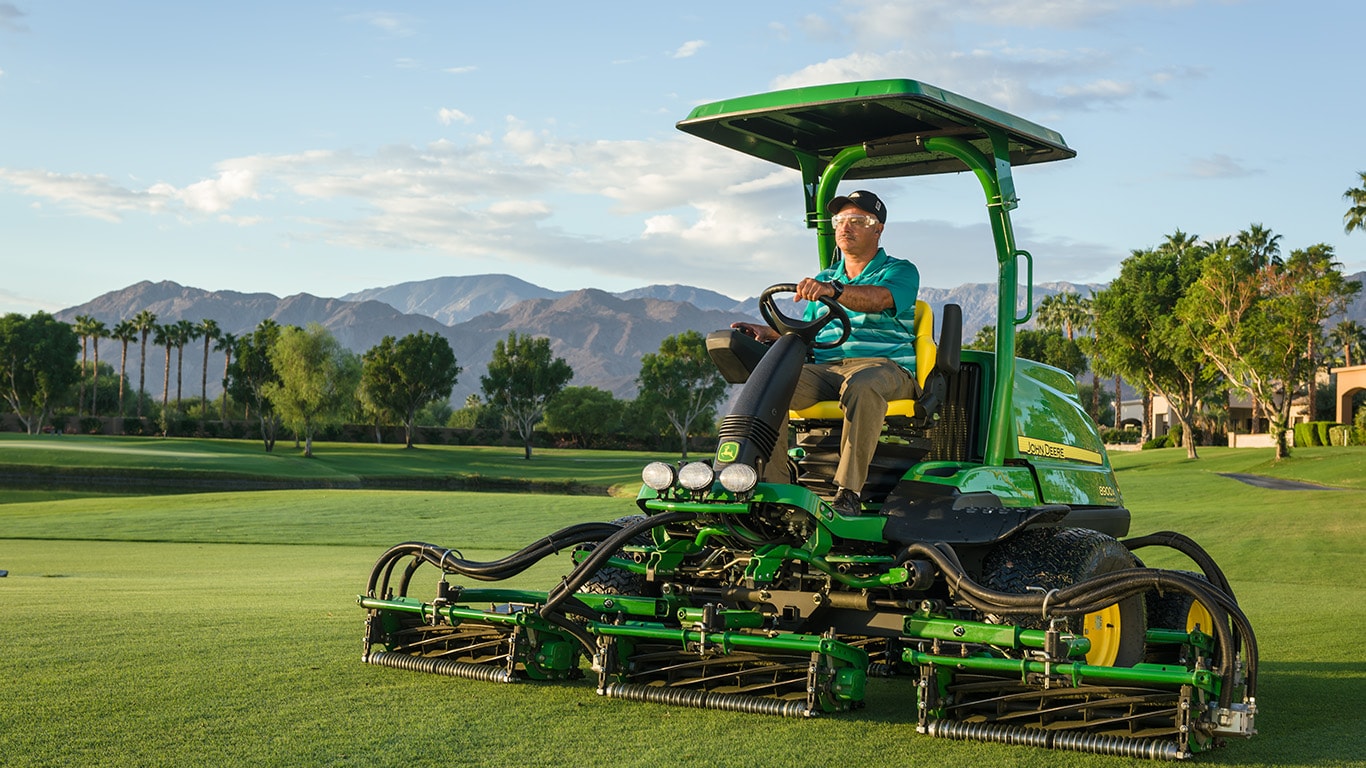 golf superintendent using precision turf apps on the course