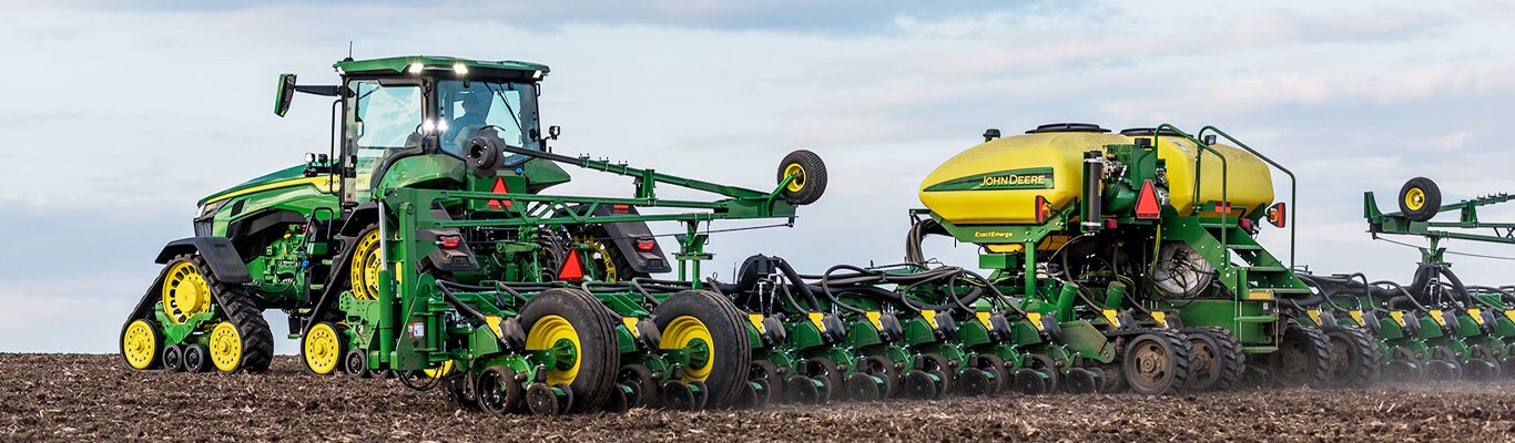 8r tractor in the field