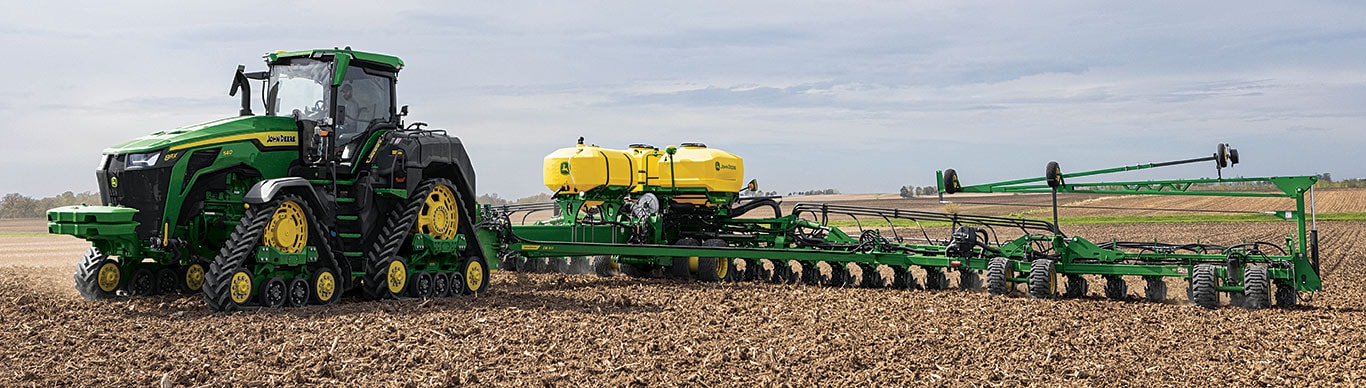 High-horsepower 8RX Tractor tilling a field.