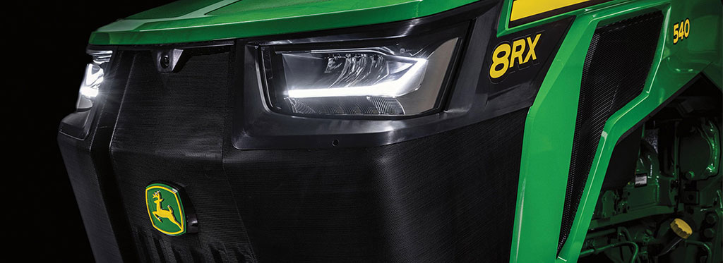 Close up view of 8RX 540 Tractor hood and decal.